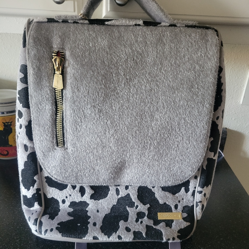 Tote and Carry cowhide backpack